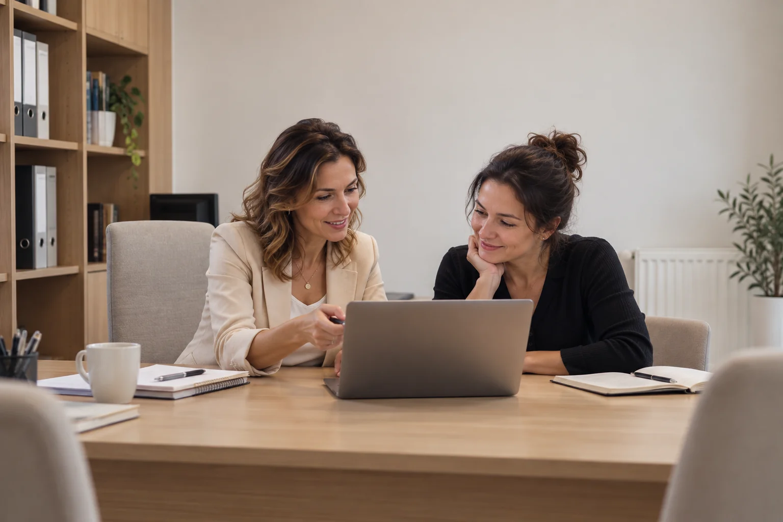 Professional matchmaker consulting a female client in an office in New Zealand